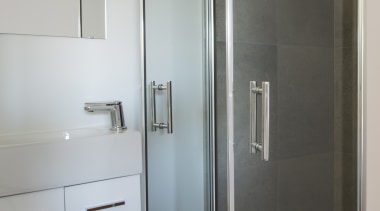 Batwing shower doors in the spare bathroom open bathroom, door, floor, glass, interior design, plumbing fixture, room, shower, gray