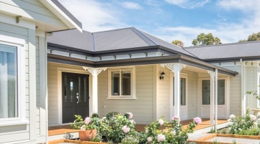 Rusticated Envira weatherboard home by David Wraight. cottage, elevation, estate, facade, home, house, porch, property, real estate, residential area, roof, siding, window, gray, white