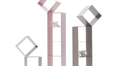 Drop Cubboard designed by Nendo for Cappellini.Bookshelves opened font, product design, white