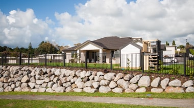 Permanence of kiln fired clay brick cladding on cottage, estate, facade, fence, home, house, land lot, outdoor structure, property, real estate, residential area, sky, suburb, white