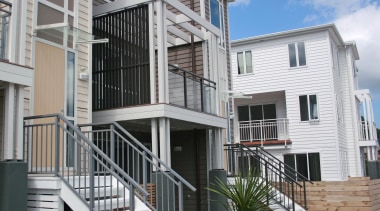 The exterior fittings installed by HomePlus are all apartment, balcony, building, condominium, deck, elevation, facade, handrail, home, house, mixed use, neighbourhood, property, real estate, residential area, siding, gray