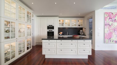 Contemporary technology is combined with timeless aesthetics and cabinetry, countertop, floor, flooring, home, interior design, kitchen, room, gray