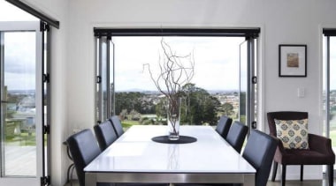 Dining room overseeing the city - White Interior floor, furniture, interior design, living room, real estate, table, window, gray