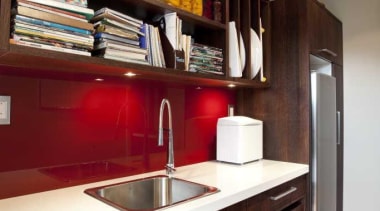 Kitchen with wooden feature and red accent - cabinetry, countertop, cuisine classique, interior design, kitchen, room, shelf, under cabinet lighting, wood, red, gray