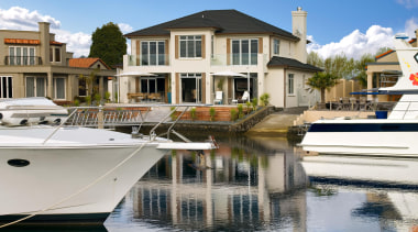 pauanui  mds exterior 1 - pauanui__mds_exterior_1 - boat, condominium, dock, home, house, marina, property, real estate, reflection, residential area, water, water transportation, waterway