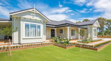 The first view of a David Wraight home backyard, cottage, elevation, estate, facade, farmhouse, home, house, lawn, mansion, property, real estate, residential area, siding, villa, window, yard