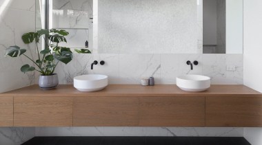 Cantilevering your vanity adds to the sense of 