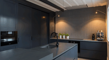 A clean black wall – then, next minute, 