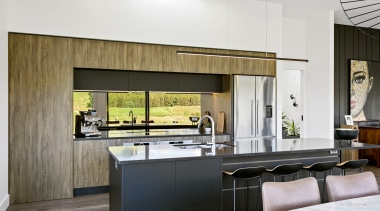 The mirror splashback means the chef doesn't miss 