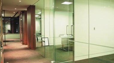 Glass wall partitioning separates some of the office architecture, ceiling, daylighting, floor, glass, handrail, house, interior design, lobby, real estate, wall, brown