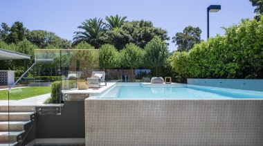 Winter Pool By Landart Landscapes. Photography: Jason Busch estate, house, leisure, property, real estate, residential area, resort, swimming pool, villa, water, teal, gray