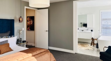 An earthy interior palette, dreamy freestanding bath and 