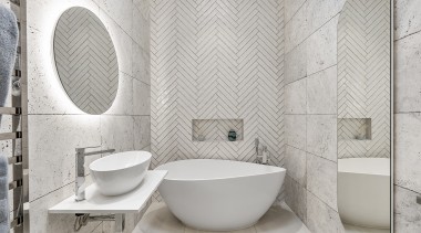 This small, windowless bathroom was designed to feel 