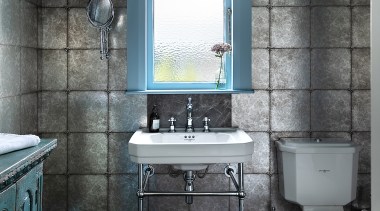 This moody powder room was designed to mix 