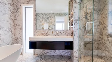 A small partition wall between the shower and 