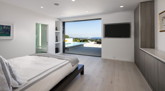Two sliding glass panels pocket back into the bedroom, floor, interior design, property, real estate, room, window, gray