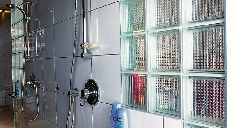 The detail of the glass bricks in a bathroom, glass, plumbing fixture, room, shelving, gray