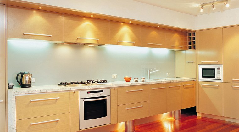 Kitchen with light veneer cabinetry, stone countertop, stainless cabinetry, ceiling, countertop, floor, flooring, hardwood, home, interior design, kitchen, laminate flooring, lighting, real estate, room, wall, wood, wood flooring, orange