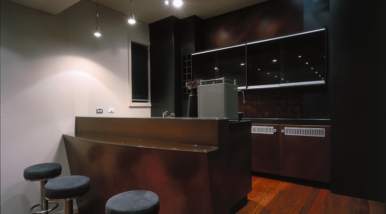 A view of a bar top with axolotl cabinetry, countertop, flooring, interior design, kitchen, lighting, room, black