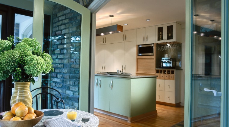Kitchen leading out onto a covered patio. Outside: ceiling, countertop, home, interior design, kitchen, real estate, window