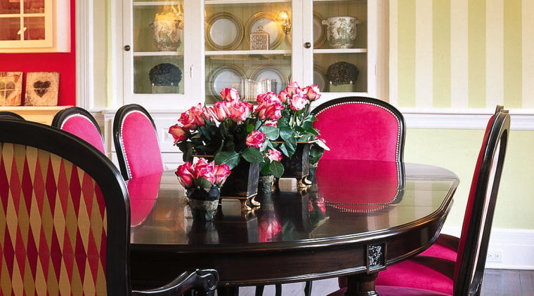 Bold color scheme. Dining room furniture hass been chair, dining room, furniture, home, interior design, kitchen & dining room table, living room, room, table, wall, window, window covering, orange, black