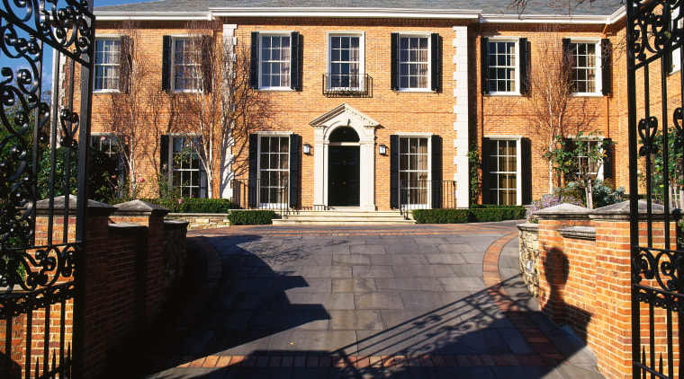 View of the front entrance through wrought iron apartment, architecture, building, condominium, estate, facade, historic house, home, house, mansion, mixed use, neighbourhood, property, real estate, reflection, residential area, window, black