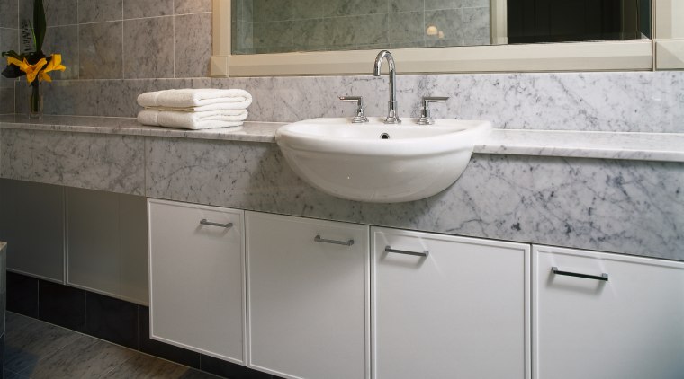 interior view of the bathroom by kitchen image bathroom, bathroom accessory, bathroom cabinet, cabinetry, countertop, floor, kitchen, room, sink, tile, gray