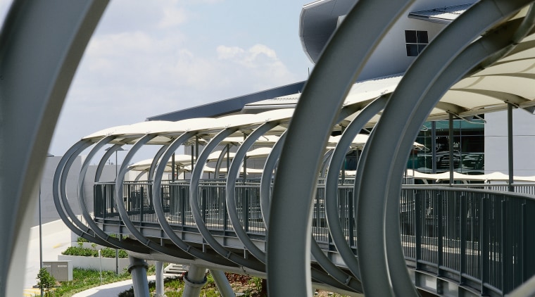 Steel framework of this pedestrian bridge. - Steel architecture, bridge, fixed link, infrastructure, iron, metal, sky, skyway, structure, wheel, black, white