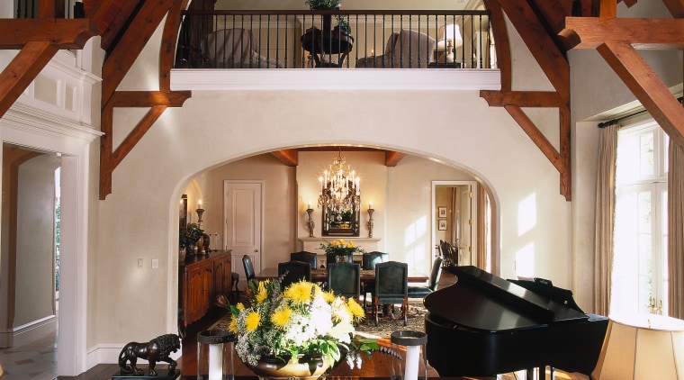 A view of a living area, wooden flooring, beam, ceiling, estate, home, interior design, living room, room, window, red