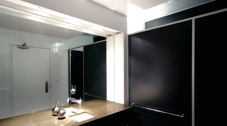 View of the bathroom, mirror, wooden vanity, black architecture, ceiling, glass, interior design, light fixture, lighting, product design, black, gray