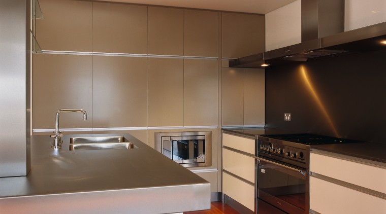 Close up view ofthe kitchen, wooden floor, spot cabinetry, countertop, cuisine classique, interior design, kitchen, property, real estate, room, under cabinet lighting, brown
