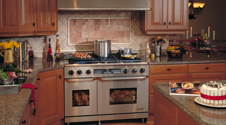 View of a kitchen, stainles steel oven, metal cabinetry, countertop, cuisine classique, flooring, interior design, kitchen, room, brown