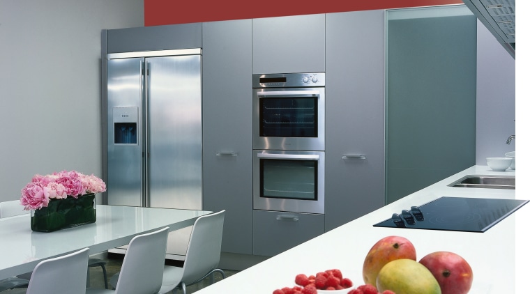 Showroom kitchen with light grey cabinetry and red countertop, home appliance, interior design, kitchen, product, product design, gray, white