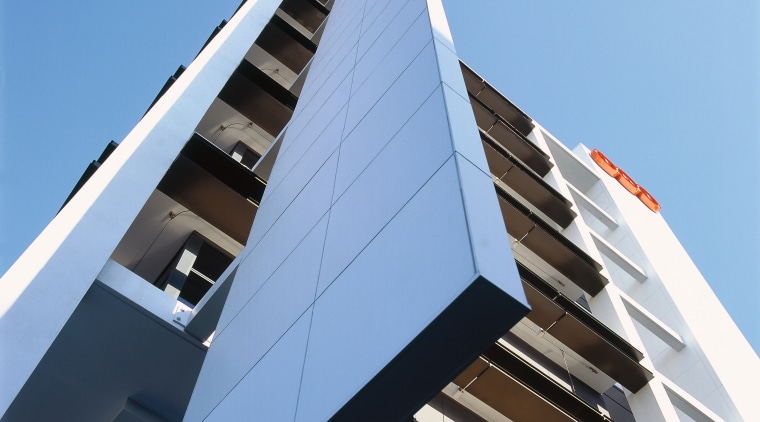 Exterior view of the TNT Australia building from angle, architecture, building, commercial building, condominium, corporate headquarters, daylighting, daytime, facade, line, sky, structure, teal, black