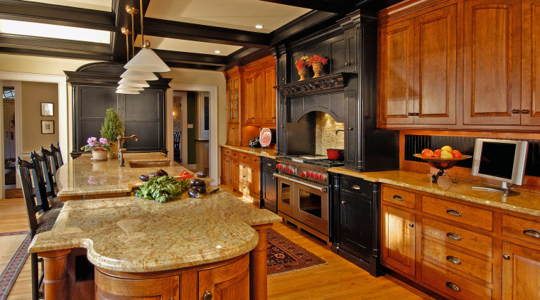 View of a kitchen, wooden flooring, wooden cabinetry, cabinetry, countertop, cuisine classique, flooring, hardwood, interior design, kitchen, room, brown