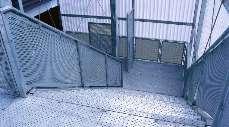 Perforated metal landing and stairs on fire escape architecture, building, daylighting, line, roof, structure, window, teal, blue