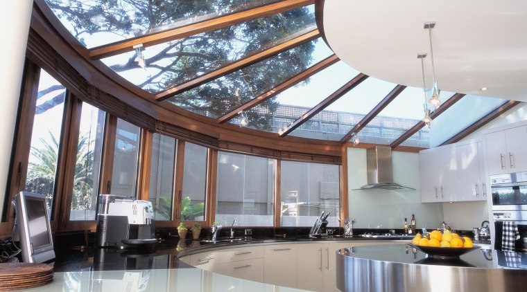 Circular shaped kitchen with windows and overhead glazing. ceiling, daylighting, interior design, real estate, roof, window, white, gray