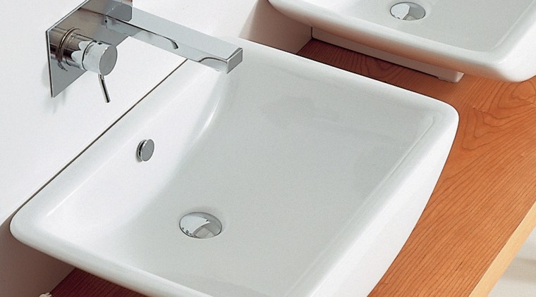 View of a wooden vanity with two curved angle, bathroom, bathroom accessory, bathroom sink, ceramic, countertop, floor, plumbing fixture, product design, sink, tap, white, gray