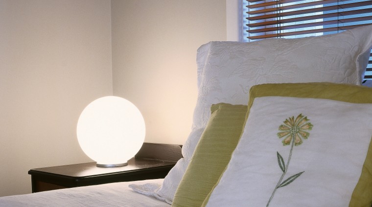 view of the ascot light fitting providing an bed, bed frame, bed sheet, bedding, bedroom, cushion, duvet cover, floor, furniture, home, interior design, linens, mattress, pillow, room, textile, wall, gray