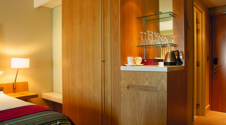 Hotel room with timber wall panelling and cabinetry, cabinetry, interior design, real estate, room, suite, wood, brown, orange