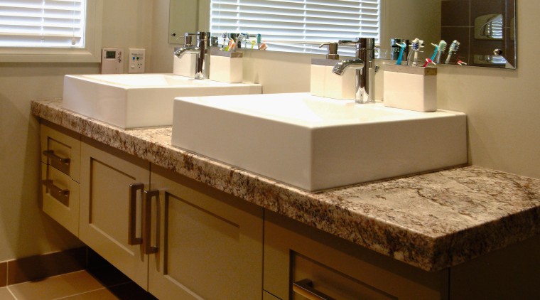 A view of a bthroom, brown tiled walls bathroom, bathroom accessory, bathroom cabinet, cabinetry, countertop, interior design, kitchen, room, sink, brown