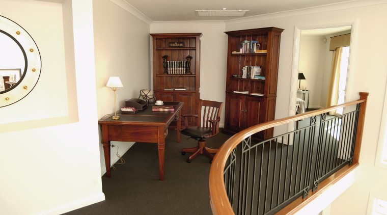 A view of the study area, brown carpet, floor, flooring, home, interior design, property, real estate, room, orange