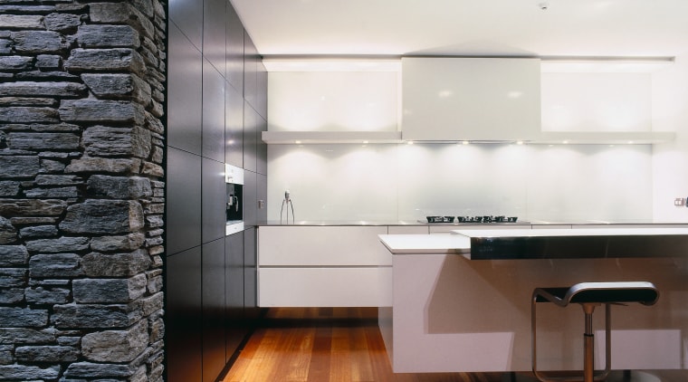 A view of a kitchen area, wooden flooring, architecture, ceiling, countertop, daylighting, floor, flooring, hardwood, house, interior design, kitchen, laminate flooring, loft, room, tile, wall, wood, wood flooring, white, black