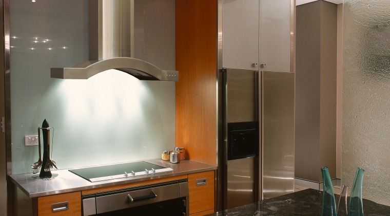 A view of a kitchen area, wooden cabinetry, cabinetry, ceiling, countertop, interior design, kitchen, room, brown, black