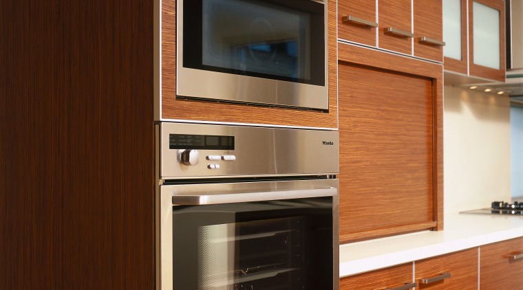 view of the miele stainless steel oven and cabinetry, countertop, furniture, home appliance, kitchen, kitchen appliance, major appliance, microwave oven, oven, product, brown