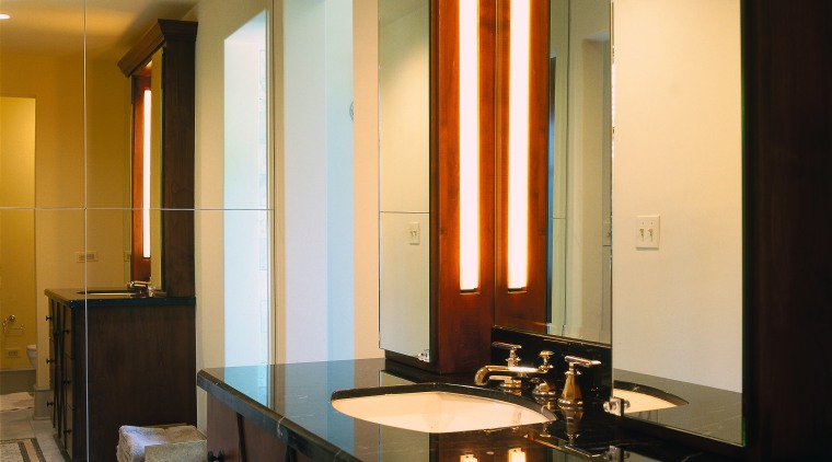 view of the bathroom featuring full length mirrored ceiling, furniture, interior design, room, table, window, black