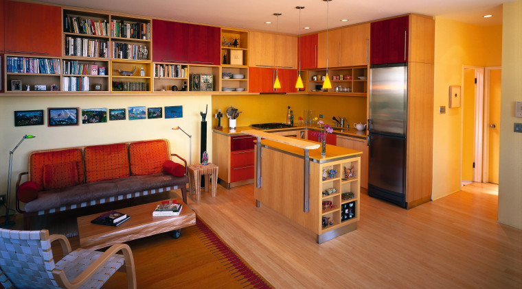 A view of the kitchen and living area, floor, flooring, hardwood, home, interior design, living room, room, wood, brown, orange