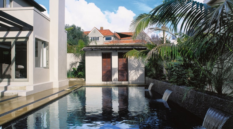 Long swimming pool with dark finish, water features, arecales, estate, hacienda, house, leisure, palm tree, property, real estate, reflecting pool, resort, swimming pool, villa, water, black