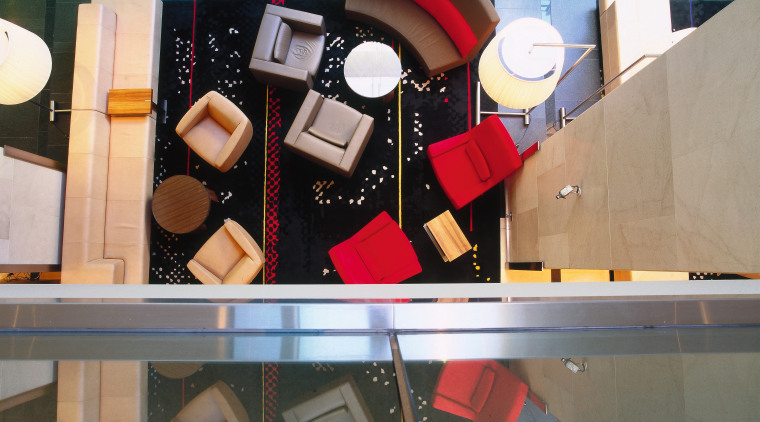 View looking straight down at hotel lobby with design, display window, product design, gray