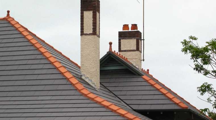 view of the ceramic tiles from nu-lok roofing building, chimney, facade, roof, sky, white, gray